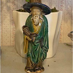 Ancient Chinese Mud men with Fish